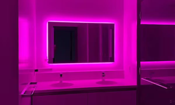 Color-changing RGB LED strips for bathroom lighting.